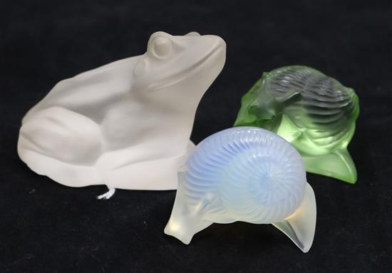 Two Lalique snails and a glass frog